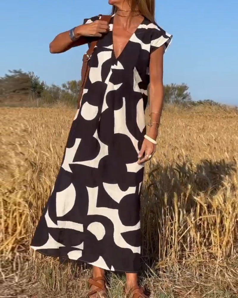 SITA - ABITO STAMPATO CON COLLO A V