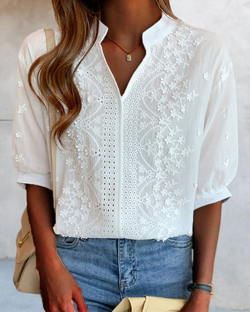 Blusa con scollatura a V e maniche a palloncino con decorazione in pizzo