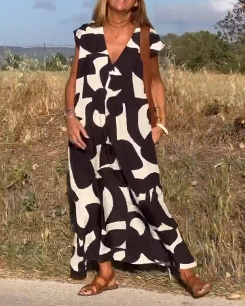 SITA - ABITO STAMPATO CON COLLO A V
